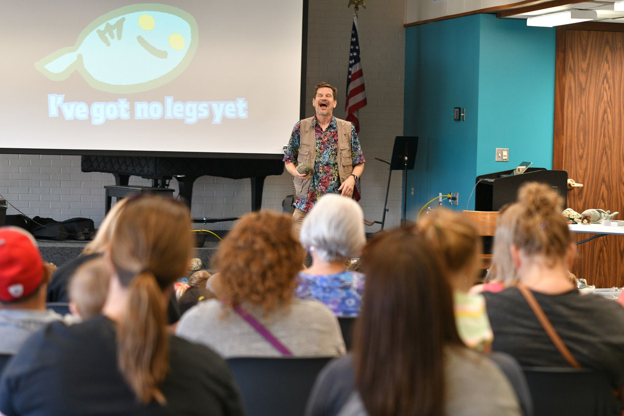 Singing zoologist Lucas Miller visits Bryan library